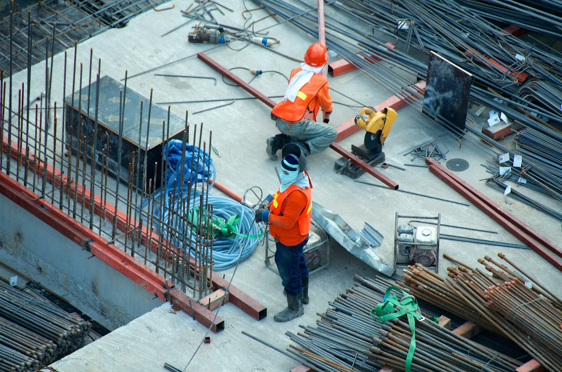 Construction site with cranes and building frame