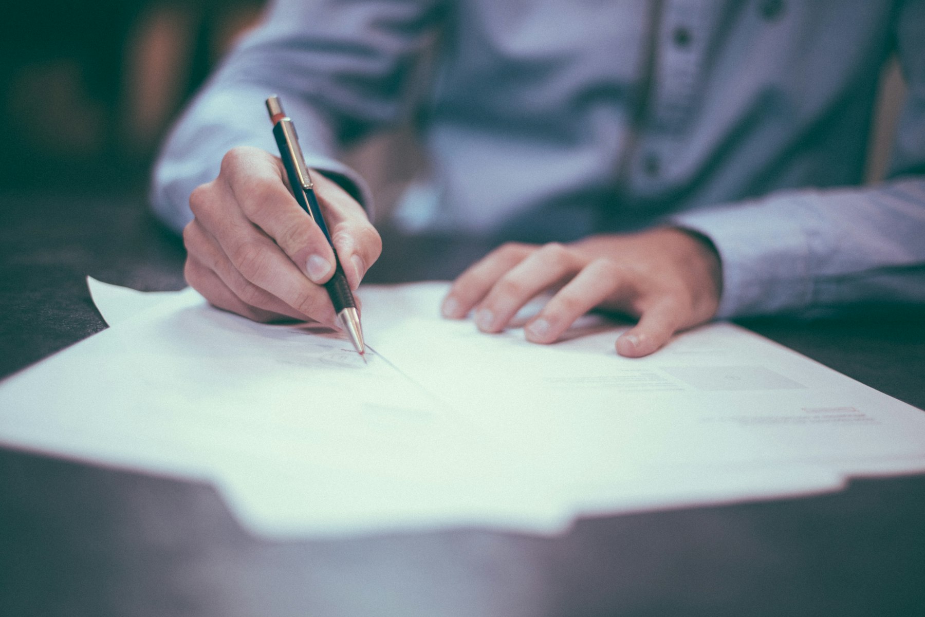 Business professional reviewing invoices and accounts receivable